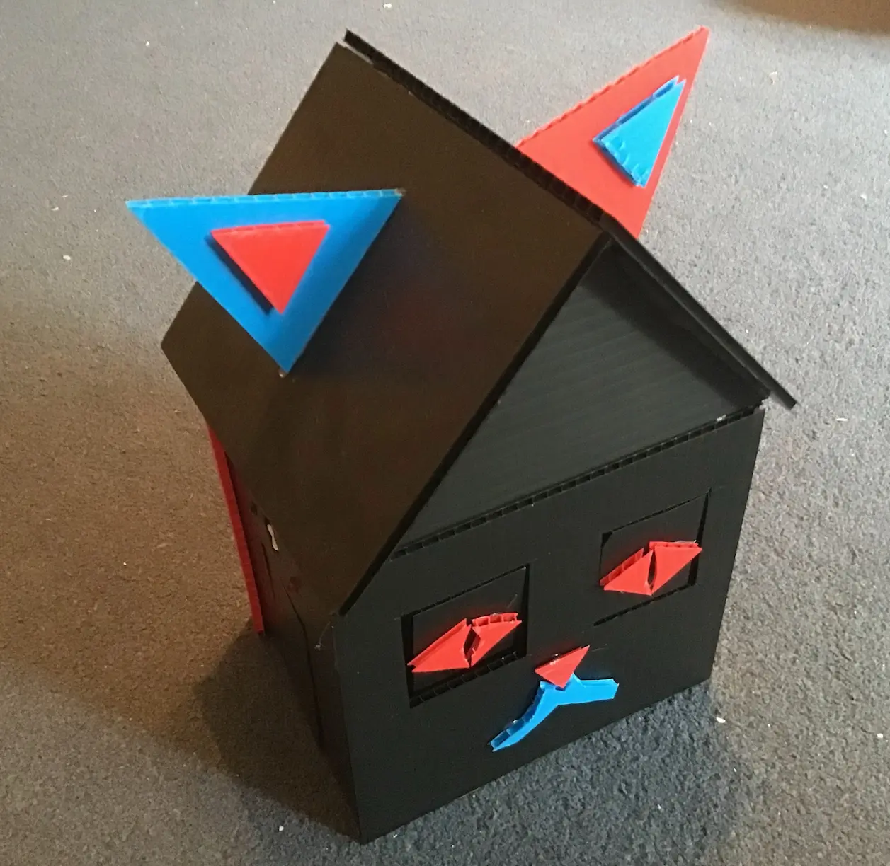 Electronic house shaped like a cat